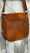 Load image into Gallery viewer, Rear view of handcrafted tan leather mandala crossbody bag showing large rear zip pocket. Designed in Australia by Dreamtime Boho.