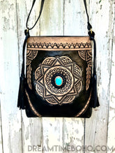 Load image into Gallery viewer, Hand tooled mandala leather boho crossbody bag with turquoise stone feature, front view.