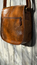 Load image into Gallery viewer, Back view of Mandala Vintage Crossbody Leather Boho Bag with rear zip pocket in distressed brown leather