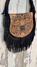 Load image into Gallery viewer, Detailed view of the hand tooled leather flap with turquoise accents, gemstone feature and fringe on the Midnight Oasis crossbody bag