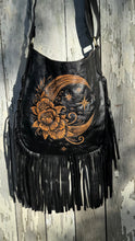 Load image into Gallery viewer, Handcrafted leather fringe boho bag featuring crescent moon and floral hand tooled artwork.