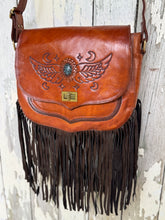 Load image into Gallery viewer, Artisan hand tooled leather boho handbag with long fringe and turquoise stone