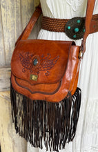 Load image into Gallery viewer, Hand tooled leather boho fringe crossbody bag with turquoise stone and celestial wings design