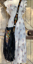 Load image into Gallery viewer, Hand tooled owl leather fringe crossbody bag worn with bohemian dress.