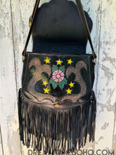 Load image into Gallery viewer, Hidden floral star detail under flap of Peace &amp; Harmony hand tooled leather boho bag

