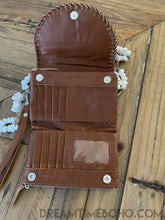 Load image into Gallery viewer, Brown bohemian leather wallet open showing multiple card slots, zip pockets and note compartments