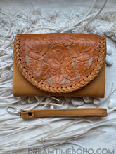 Load image into Gallery viewer, Tan boho leather wallet with hand tooled floral front flap and removable wrist strap
