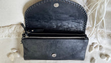 Load image into Gallery viewer, Black genuine leather wallet clutch open showing large zip coin compartment and magnetic closure
