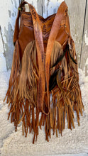 Load image into Gallery viewer, Close up of the adjustable hand tooled leather strap with antique buckle on the Rustic Feather boho crossbody bag.