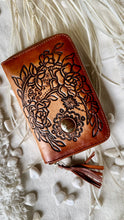 Load image into Gallery viewer, Rustic Moon hand tooled antique brown leather wallet with floral moon design and gemstone centrepiece. Boho leather wallet Dreamtime Boho 