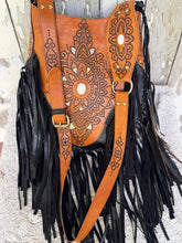 Load image into Gallery viewer, Main image of Sahara Moon black and tan handcrafted boho leather fringe crossbody bag with mandala detailing and white feature stone