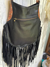 Load image into Gallery viewer, Back view of Sahara Moon mandala black leather fringe boho crossbody bag with rear zip pocket and soft genuine leather