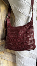 Load image into Gallery viewer, Small burgundy leather boho crossbody bag with woven leather detailing and adjustable shoulder strap by Dreamtime Boho Australia.
