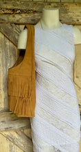 Load image into Gallery viewer, Tan suede leather fringe shoulder bag worn on mannequin showing oversized boho shoulder bag fit.
