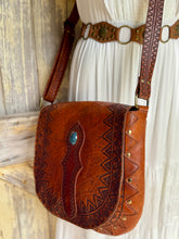 Load image into Gallery viewer, Western boho hand tooled leather crossbody bag with turquoise stone worn as crossbody