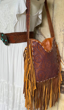 Load image into Gallery viewer, Hand tooled leather boho fringe shoulder bag styled with white dress and western belt