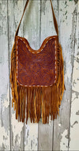 Load image into Gallery viewer, Floral hand tooled leather boho fringe handbag with flowing two tone leather fringe