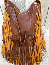 Load image into Gallery viewer, Rear view of genuine leather boho fringe shoulder bag with hand tooled leather strap
