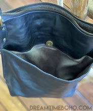 Load image into Gallery viewer, Interior of Dragonfly leather boho crossbody bag showing internal open storage pockets
